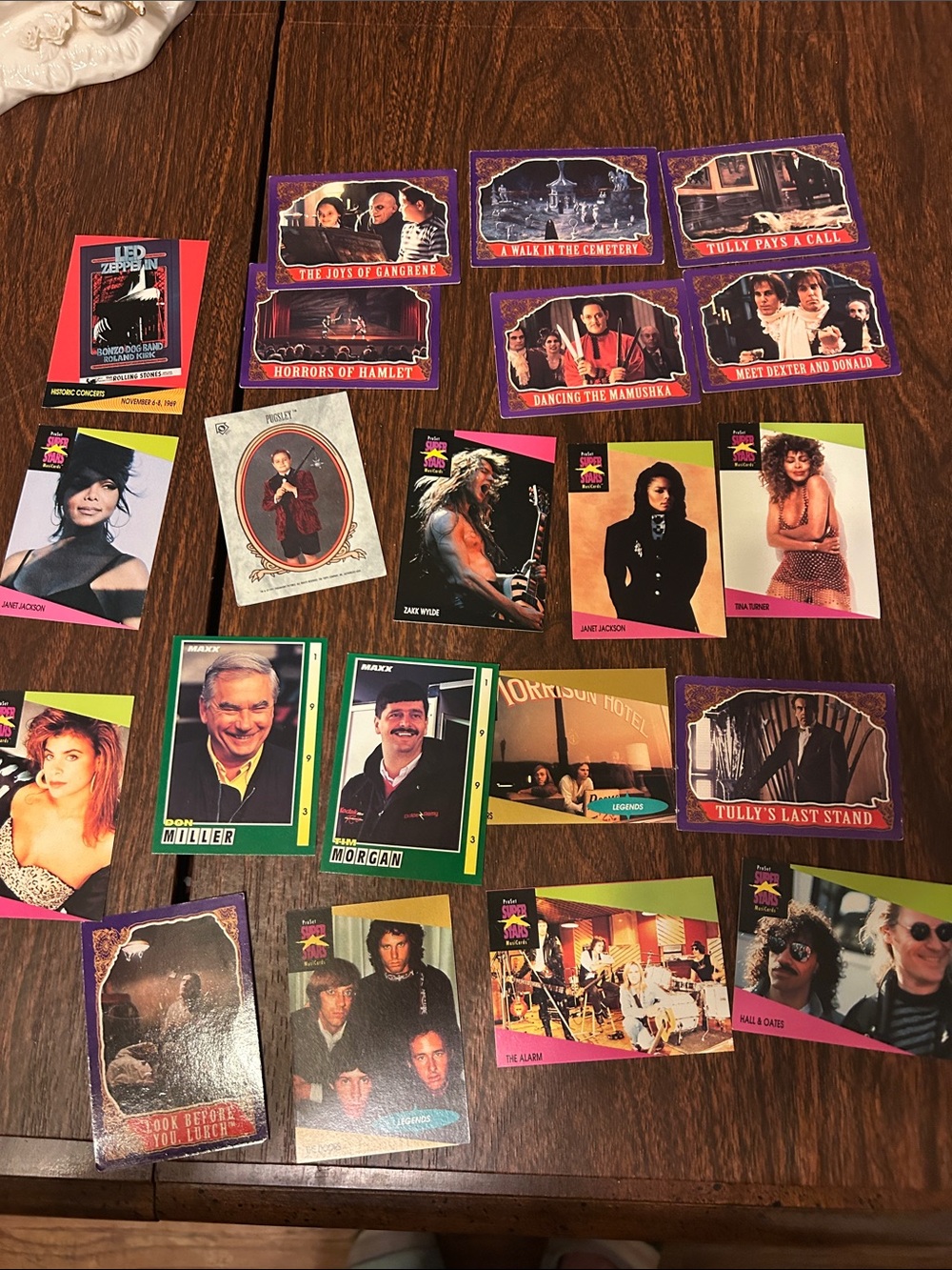 Over $50 worth of movie stars, movies, rock bands cards.